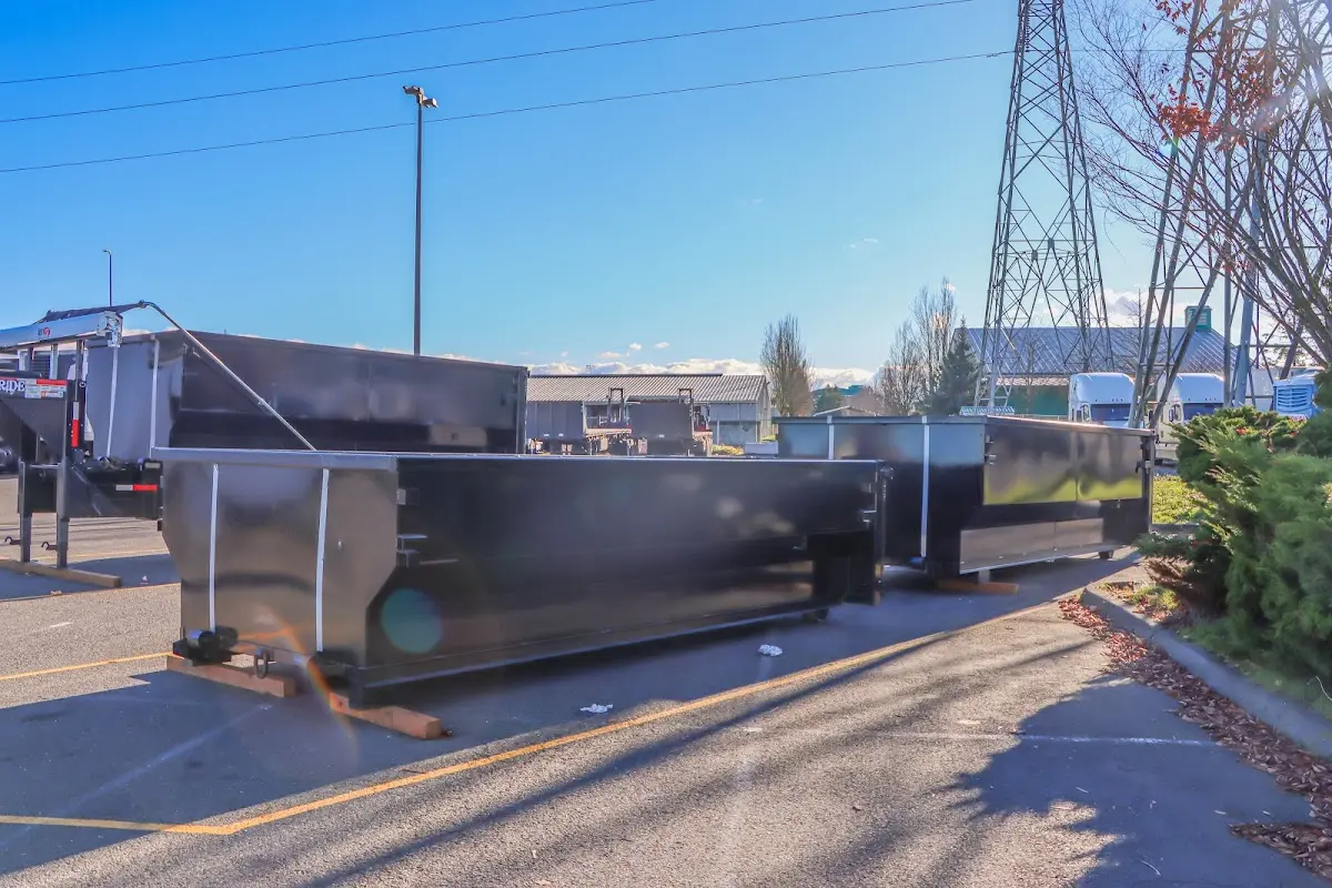 Roll-off dumpster ready for waste disposal at job site for Roofing Dumpster Rental in Siloam Springs